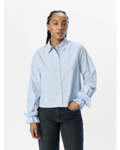 Chemise à poignets volantés