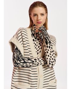 Cardigan réversible blanc cassé sans manches
