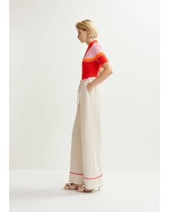 Pantalon large blanc cassé et rouge à bord contrasté
